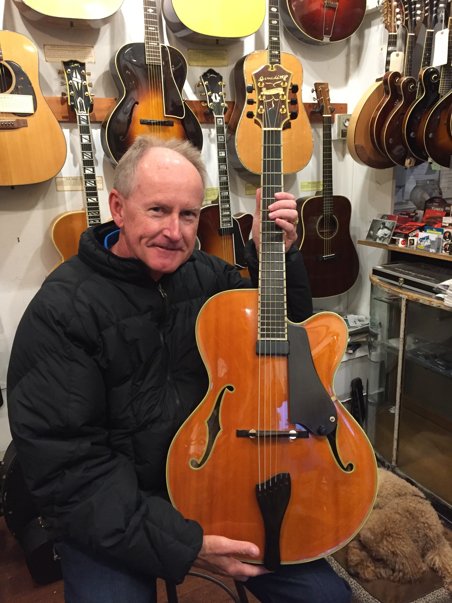 Gary Thomas holding a Benedetto archtop — original photograph