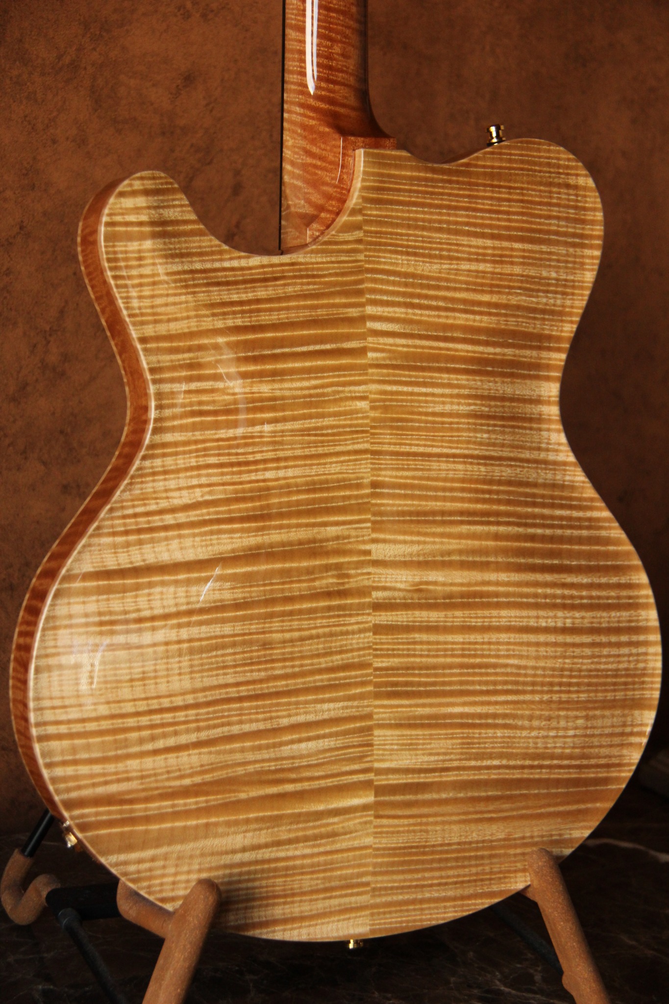 Solid carved curly-maple back